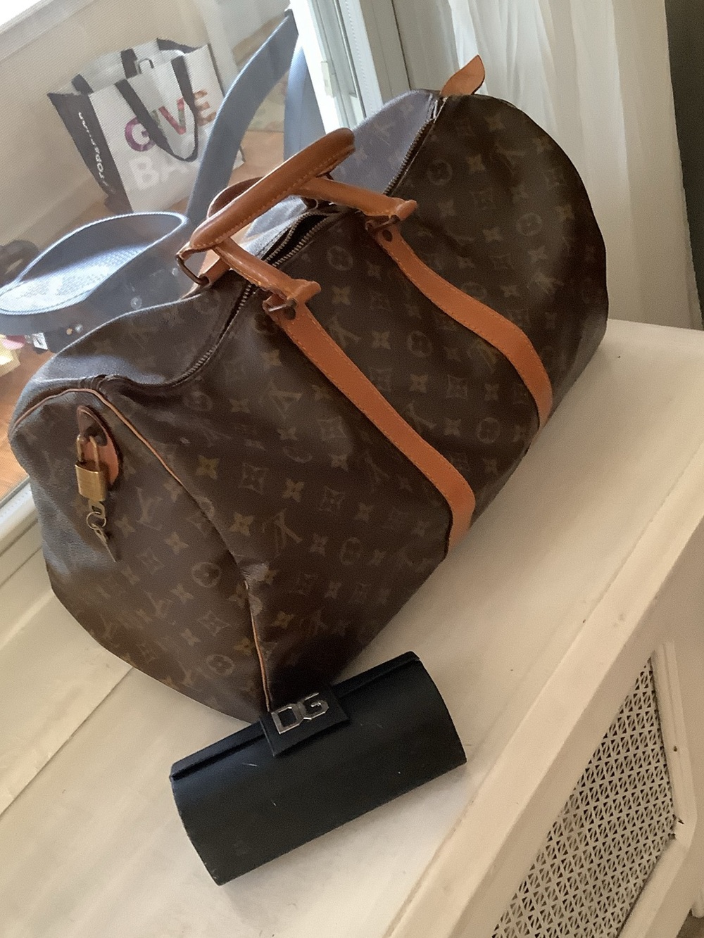 Louis Vuitton Brown Monogram Duffle with Tan Leather Handles